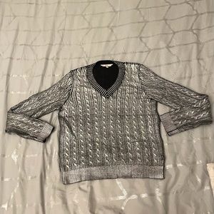 Laminated effect, knitted sweater.